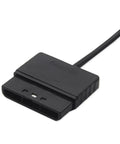 Close-up view of a black controller extension cable connector for gaming, part of Upgrade Your Rig With This Badass Game Console Extension Cord Power Cable That Clicks In With Hassle Free Plug And Play Power To Blast Your Play Zone Further While Standing Bully Tough Against Wear And Wrecking Those Annoying Trip Hazards Dead.