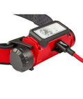 RedLithium USB Hard Hat Headlamp With LED Power 2163-21 Includes One Battery And One Charger USB Rechargeable Safety Lighting. Close-up view with charging cable.