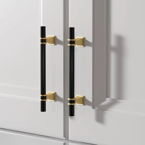 Six And A Quarter Inch Black And Gold Cabinet Handles Set Of Ten For Kitchen Cabinets Dressers And Wardrobes With Durable Zinc Alloy And Matte Finish DIY Friendly With Two Screw Sizes For Three Inch Hole Centers mounted on white cabinet