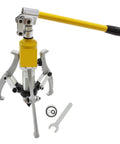 Pro Level Hydraulic Puller 5 Ton Capacity With Swappable Two And Three Claw Jaws Heavy Duty Bearing Hub Remover Built Tough Using Solid Alloy Steel For No Nonsense Garage Work Every Time shown with attached jaws and wrench.