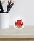 Clear 4 Inch Snow Globe Kit with red rose on desk, part of 8 Pack for DIY Craft Projects and Home Decor, Fillable Plastic Ball with Screw Cap