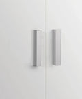 Adhesive Cabinet Pulls 5 Pack 3 To 9 Sixteen Inch Length Covers 3 Inch Hole Center No Drill Finger Pulls installed on white cabinet