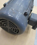 Close-up of M7042T-5 Electric Motor 36N04-1870, showing heavy-duty frame, industrial grade replacement for machinery.