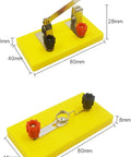 Hands On Electromagnet Experiment Kit For Teens switch on yellow base, measures 80mm x 40mm, with black and red connectors.