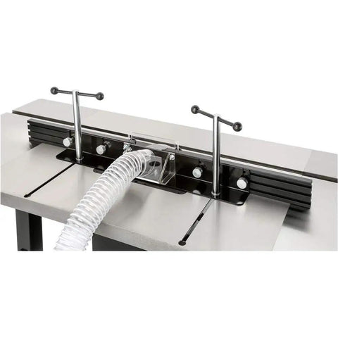 Pro Grade Router Table Featuring Precision Lift Control And Massive Cast Iron Wings For Killer Cabinet Work and dust collection hose on the base.