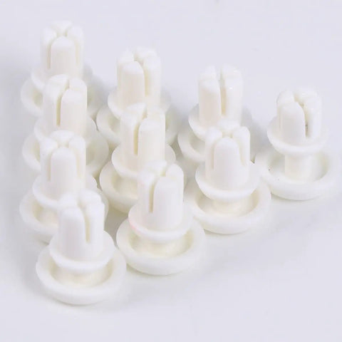 100 Piece Tough As Nails R Type Plastic Rivet Nut Kit With Nylon Buckle Clips For Car Panels And Pcb Boards Snaps Right In For Auto Trim And Diy Fixes No Sweat Installation Guaranteed All Day white nylon clips laid out on a flat surface.