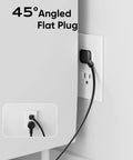 45-degree angled flat plug of the 8 In 1 Desk Clamp Power Strip With USB-C PD 20W Fast Charging, Plug And Play, mounted to an outlet.