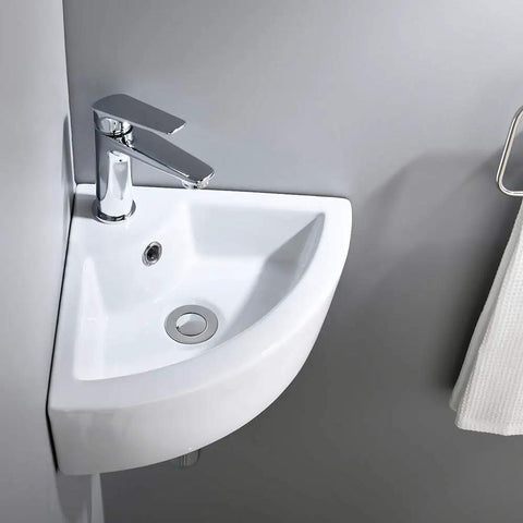 Wall Mount Corner Vessel Sink With Chrome Faucet And Pop Up Drain, white porcelain, installed in small bathroom corner
