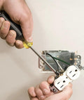 Person using 9-Piece Screwdriver Set With Magnetizer And Demagnetizer For Magnetic Tips, Includes Cabinet Tips Three Sixteenth Inch