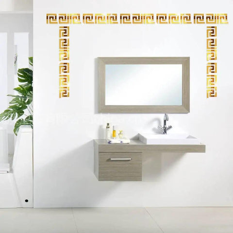 Gold 64 Piece DIY Mirror Wall Sticker Set Removable Adhesive Decals for Home Art Room Bedroom Decor displayed around a mirror