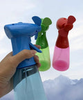 Two Pack Portable Battery Powered Misting Fans Handheld Evaporative Coolers with Safe Soft Blades in blue, green, and red colors.