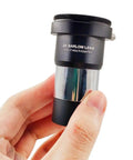 2X Barlow Lens For Telescopes And DSLR Cams, 1.25 Inch Metal Body With Fully Multicoated Optics held in hand