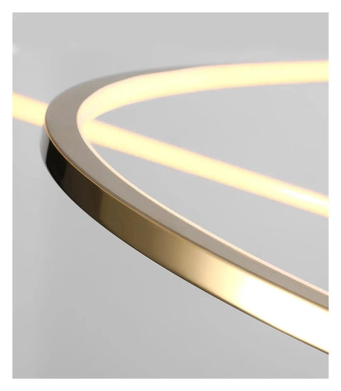 Close-up view of Modern Stainless Steel Creative LED Pendant Lamp Luxury Living Room Restaurant Bedroom Hotel Minimalist Chandelier Decor Light.