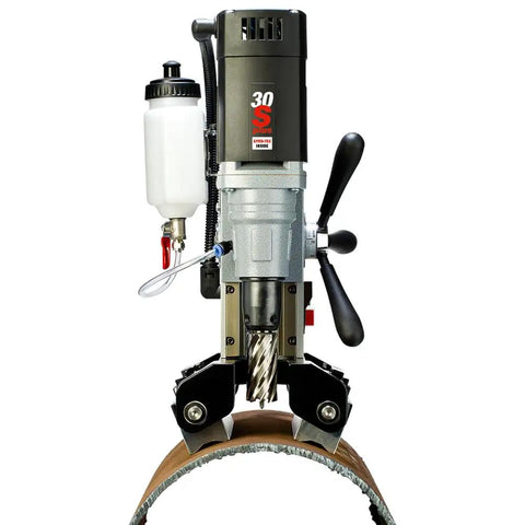 Tough As Nails Magnetic Drilling Machine With Zero Cord Magnet Base For Flat And Curved Steel Sheet Metals Quick Release Feature No Sweat Shop Ready Mag Drill Tool on curved steel pipe.