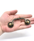 2 Pack Antique Drawer Pulls in Vintage Bronze Finish with 3 Inch Center Hole Spacing Rustic Zinc Alloy Cabinet Handles held in hand