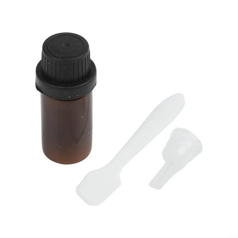 Rear Window Defroster Repair Kit For Heated Glass Grid Quick DIY Fix With Conductive Glue includes vial, brush, and applicator.