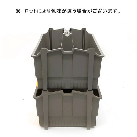 Stacked grey plastic storage bins with deep compartments for organizing tools, suitable for use in workshops and garages.