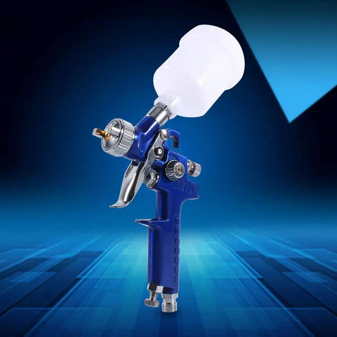 Precision Mini Gravity Feed HVLP Spray Paint Gun With 0.8mm Nozzle And 100ml Cup in blue with transparent cup.