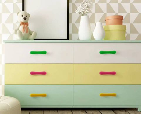 Super Cute Soft Rubber Cabinet Handles 5 Inch Long with Zinc Alloy Base Kid Safe Toddler Friendly Drawer Knobs Rust Proof Smooth Finish Yellow Four Pack Includes Installation Screws on modern dresser.