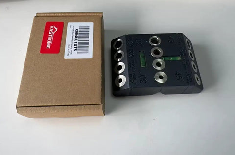 Multi Angle Cable Railing Drill Guide Jig With Built In Bubble Level For Deck Posts And Stair Railings next to its packaging.