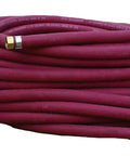 Badass Heavy Duty 1 Inch Red Field Hose Crafted From Abrasion Proof Synthetic Rubber With Reinforced Spiral Yarn coiled with brass fittings.