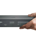 Badass Next Generation Firewall Rolls In At Two Point Five Gbps Loaded With One Year Total Secure Advanced Protection Bundle being held, sleek desktop design.