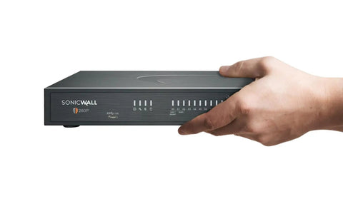 Badass Next Generation Firewall Rolls In At Two Point Five Gbps Loaded With One Year Total Secure Advanced Protection Bundle being held, sleek desktop design.
