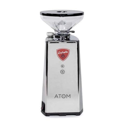 Rock Solid Hella Quiet Espresso Grinder Featuring Precision 65 Mm Flat Burrs And Compact Short Hopper Programmable Dosing Settings Deliver Wicked Shot Quality In Sleek Chrome Finish, showcasing chrome design and digital controls.
