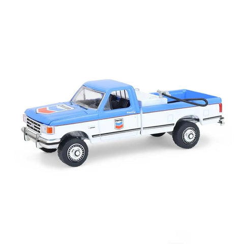 Ford F-250 XL 1991 Diecast Truck One Sixty Fourth Scale Chevron Emblems Blue Collar Series 14 Replica With Rubber Wheels Collectible Display Model Not For Play With Realistic Detailing For Collectors, side view