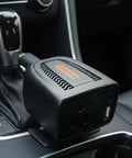 Ultra Compact 100W Power Inverter With Wicked Quiet Fanless Design, car charger adapter in vehicle center console.