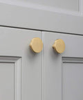 All Brass Cabinet Knob Set Round Drawer Pulls For Dressers And Kitchen Cabinets, installed on white cabinet doors