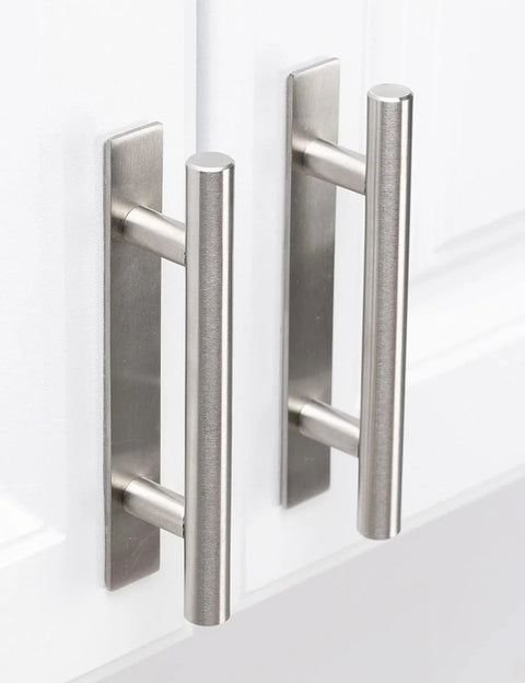 Two Pack Self Adhesive Drawer Handles Made From Corrosion Resistant Aluminum Alloy No Drilling Required Cabinet Pulls For Drawers Closets And More In Silver Finish Each Handle Measures About Five Point Nine Inches Long Five Point Nine Inches Wide And One installed on white cabinet doors