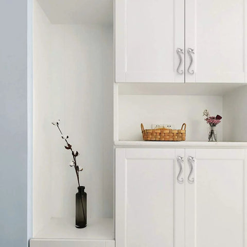 White cabinets with seahorse shaped drawer pulls ocean theme marine style cabinet hardware zinc alloy coastal metal decorative pulls for dresser chest cabinet cupboard and closet in durable silver finish installed.