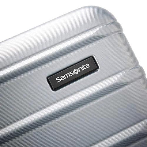 Samsonite luggage front close-up; Artic Silver polycarbonate hardside with brand badge