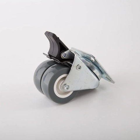 Heavy Duty Twin Caster Wheels with Plate for Furniture Carts showing dual gray wheels and locking mechanism from a side angle.