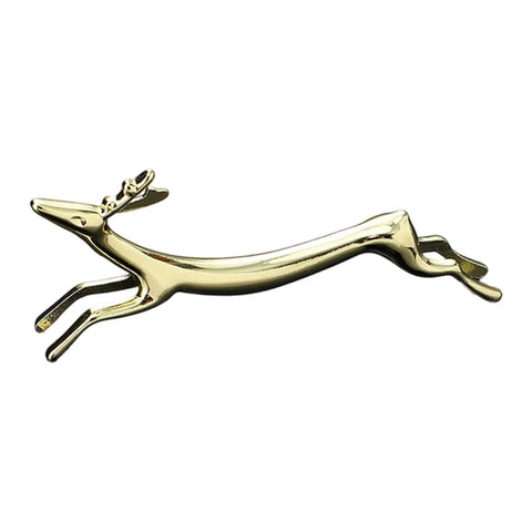 Gold decorative deer figurine with sleek design on white background.