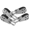 Four stainless steel sailing pulley blocks set with bearing wheels for boat anchor and rope, heavy duty kayak hardware for sailing and boating.