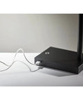 Base of Colby Adjustable Desk Lamp With 15.5 To 32.5 Inch Reach 9W Integrated LED Matte Black Metal Finish showing USB port