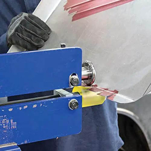 Worker using 9 Pc Bead Roller Die Set For Metal Fabrication With 1 Polyurethane Wheel on sheet metal, showing offset die in action.