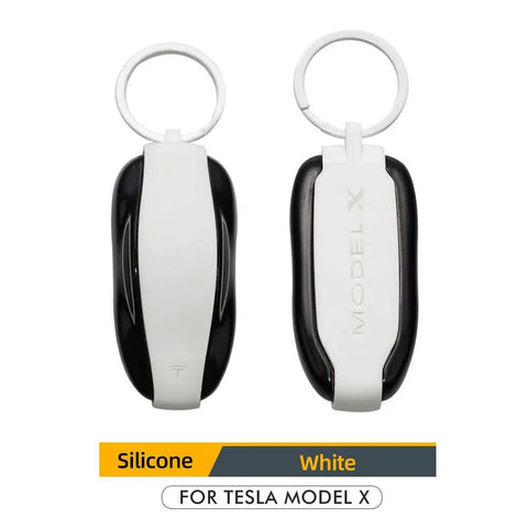 Show Off Your Tesla Model X Whip With This Dope Silicone Key Fob Cover In Clean White Featuring Crack And Scratch Shield And Reliable Clasp Keychain To Keep Your Essential Keys Legit Safe, showing white and black silicone key fob cover.