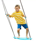 Child playing on blue Kick Stand Up Tree Swing For Backyard And Outdoor Swingsets Kid Friendly Platform Swing With Adjustable Handles