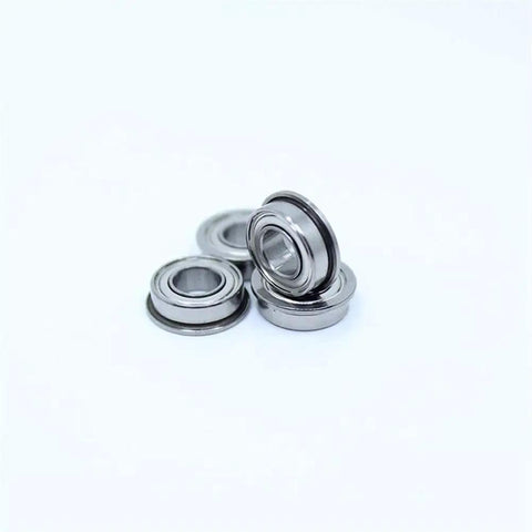 Ten Pack Snazzy 6x12x4mm Stainless Steel Smf126ZZ Flanged Bearings shown from different angles on a white background.