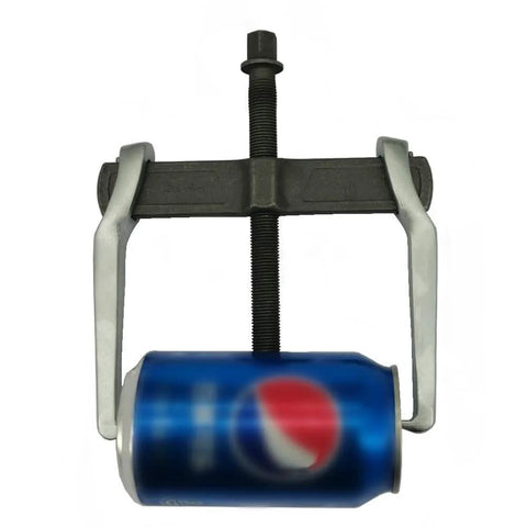 Heavy Duty 2 Jaw Puller With Single Hook Lifting Tool, chrome vanadium steel, shown with a can for size reference.