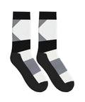 Fresh Black And White Piano Grid Print Crew Socks For Men And Women Straight Up Comfy Polyester Athletic Hosiery in a geometric design.