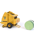 604R Round Hay Baler Diecast Model With Hay Bale One Sixty Fourth Scale For Collectors Realistic Detailing Ideal For Display And Model Railroading Not For Play Speccast Cust1639 - Yellow baler model with hay bale