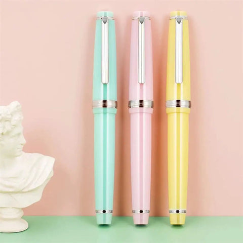 Three pastel-colored acrylic fountain pens with 0.5mm nib for school and office use, smooth writing and comfortable grip, unisex design.