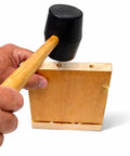 Person assembling wood with mallet using Birch Dowel Pins 1/4 In x 1-1/8 In 200-Pack Fluted And Ribbed For Clean Joints High-Strength Wood Dowels