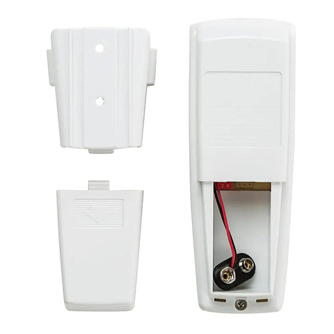 Back view of universal ceiling fan remote control kit with open battery compartment and mount pieces