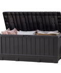 92 Gallon Resin Deck Box In Dark Gray For Outdoor Storage Keep Patio Cushions And Throw Pillows Garden Tools Pool Floats Neat And Ready To Grab On The Patio Or In The Garage with lid open and cushions inside