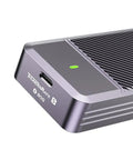 Close-up of Next Level M.2 NVMe 2280 Hard Drive Enclosure With Thunderbolt 5 hookup showing port and green indicator light.